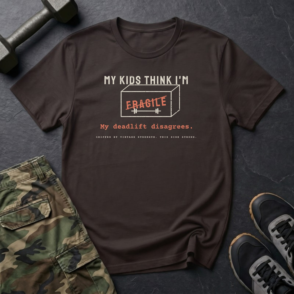 My Kids Think I'm Fragile. My Deadlift Disagrees. T-Shirt in Dark Chocolate