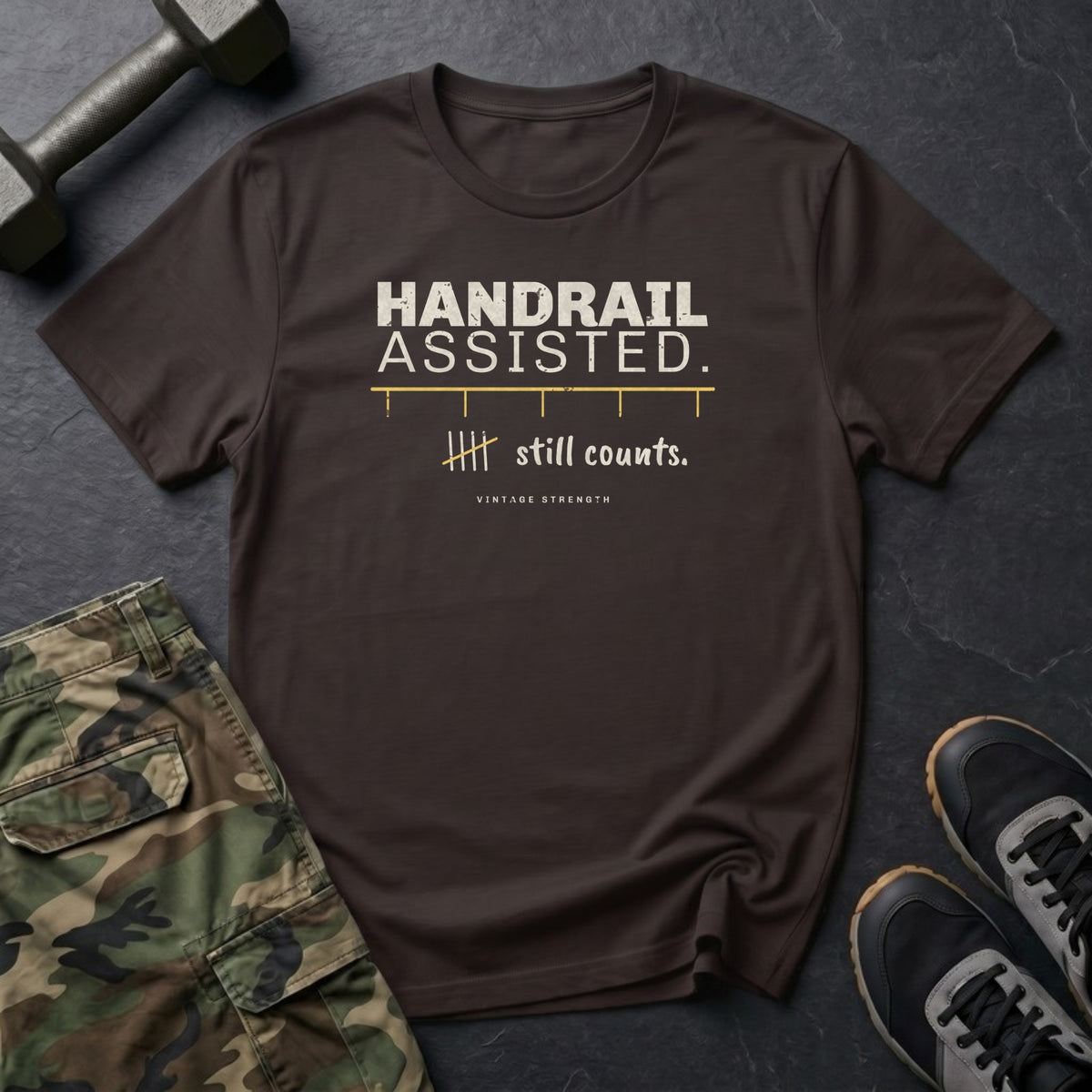 Handrail Assisted. Still Counts. T-Shirt in Dark Chocolate