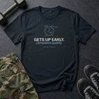 Gets Up Early. Complains Quietly. T-Shirt in Black