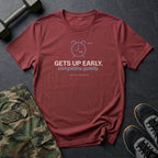 Gets Up Early. Complains Quietly. T-Shirt in Heather Cardinal