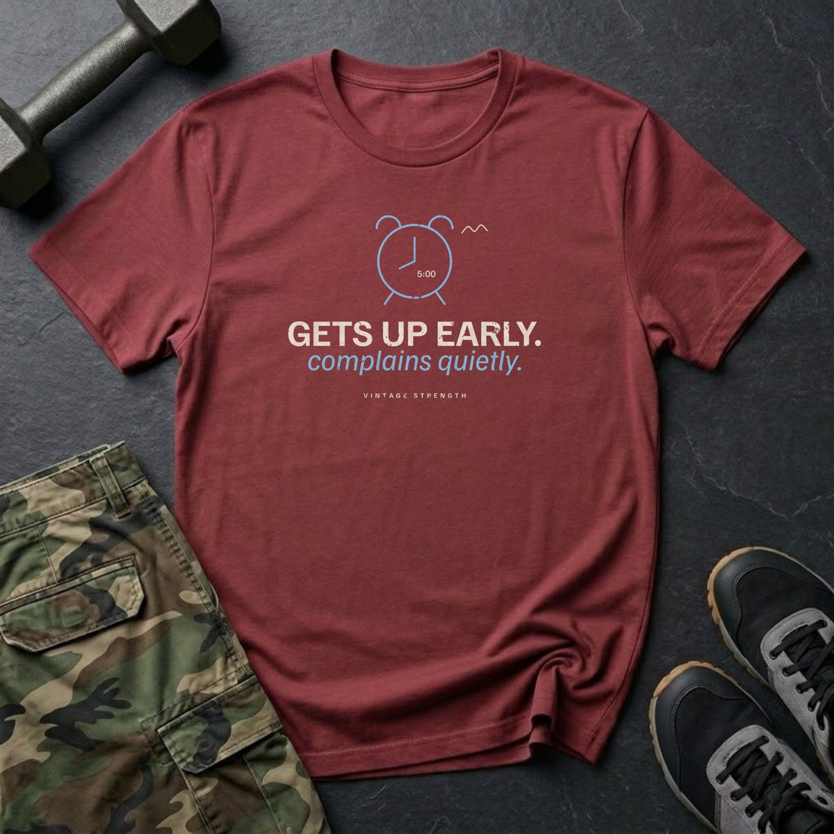 Gets Up Early. Complains Quietly. T-Shirt in Heather Cardinal
