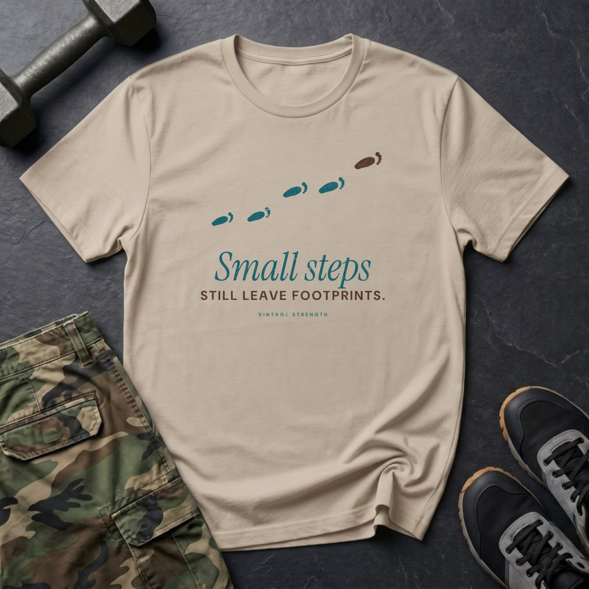 Small Steps Still Leave Footprints T-Shirt in Sand