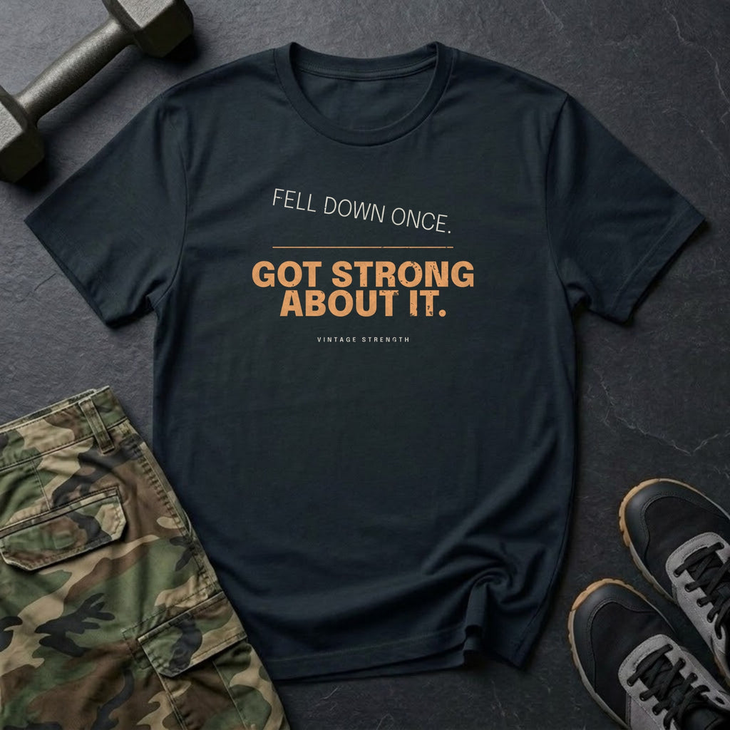 Fell Down Once. Got Strong About It. T-Shirt in Black