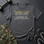 Picked Last in Gym Class. Picking Up Heavy Things Now. T-Shirt in Charcoal