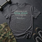 Stretching Is Just Lying Down With Ambition T-Shirt in Charcoal