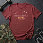 I Learned to Walk Twice T-Shirt in Heather Cardinal