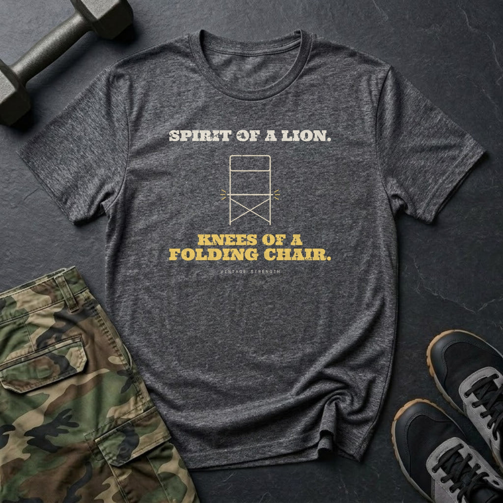 Spirit of a Lion. Knees of a Folding Chair. T-Shirt in Charcoal