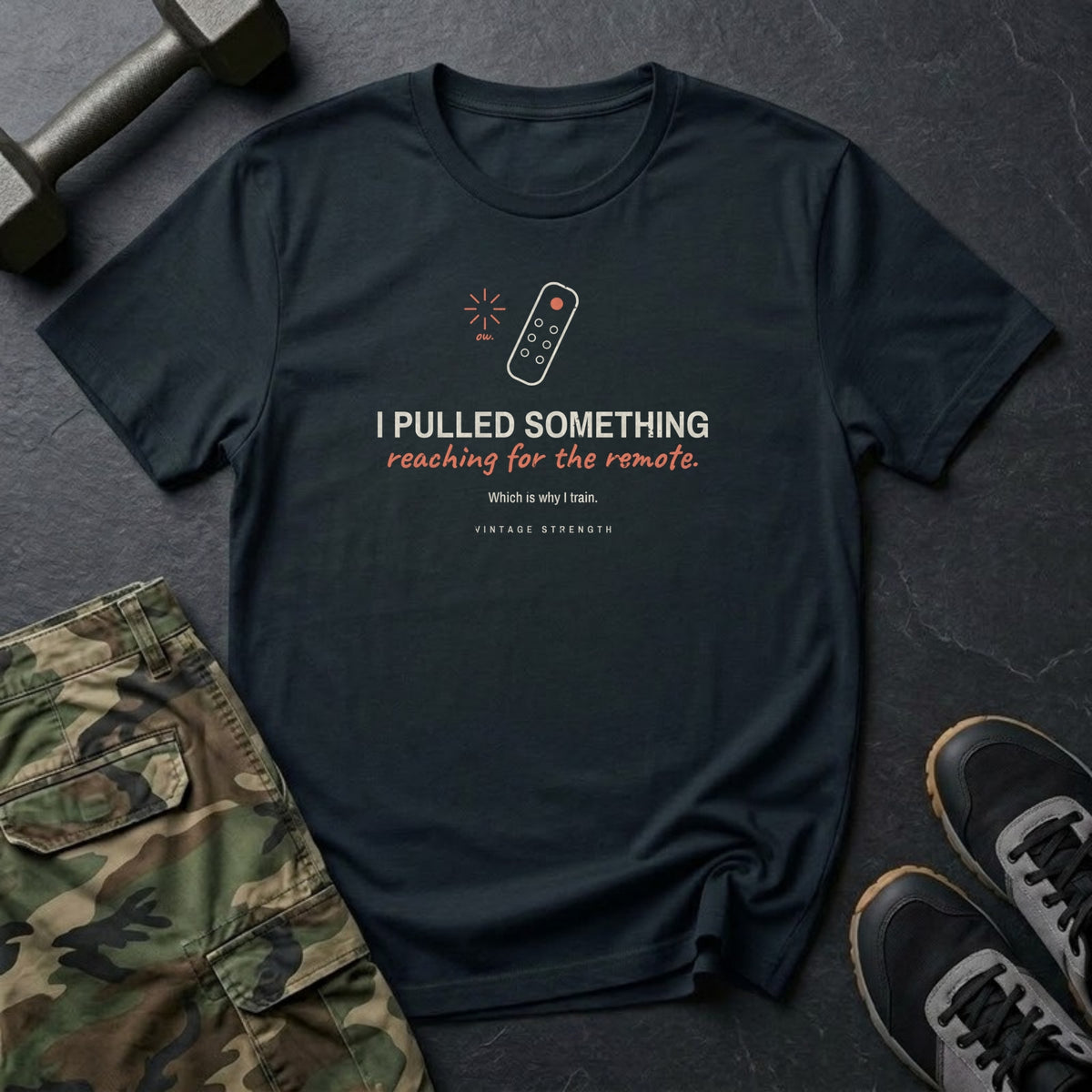 I Pulled Something Reaching for the Remote T-Shirt in Black