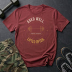 Aged Well. Lifted Often. T-Shirt in Heather Cardinal
